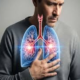 Man gripping his chest with a digital illustration of blue lungs and a trachea overlaid on his torso